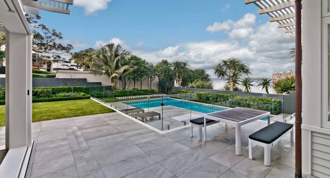 Beautiful property with frameless glass pool fence